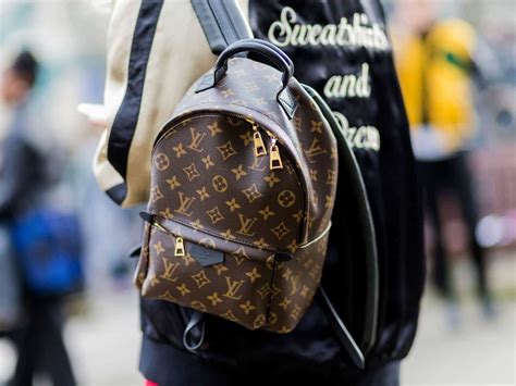 fake vs real louis vuitton backpack|is louis vuitton a scam.